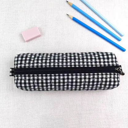 Black White Grid Print Elongated Cylindrical Quilted Stationery Pouch With Heart Stitch Detailing And Full Width Top Slide Zipper Closure