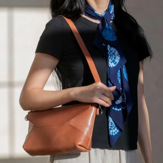 Warm Russet Brown Geometric Fold Envelope Shoulder Pouch With Origami Panel Detailing, Polished Metal Buckle Carry Strap And Side Ring Hardware Fasteners