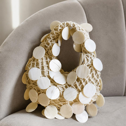 Soft Ivory Open Crochet Curved Hobo Handbag With Scattered Glossy Circular Shell Disc Embellishments And Integrated Loop Carry Handle