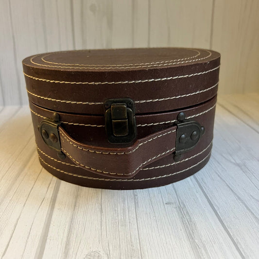 Rich Warm Brown Compact Oval Vintage Carry Case With Concentric Contrast Stitching, Antique Metal Latch Hardware And Single Curved Front Hand Grip