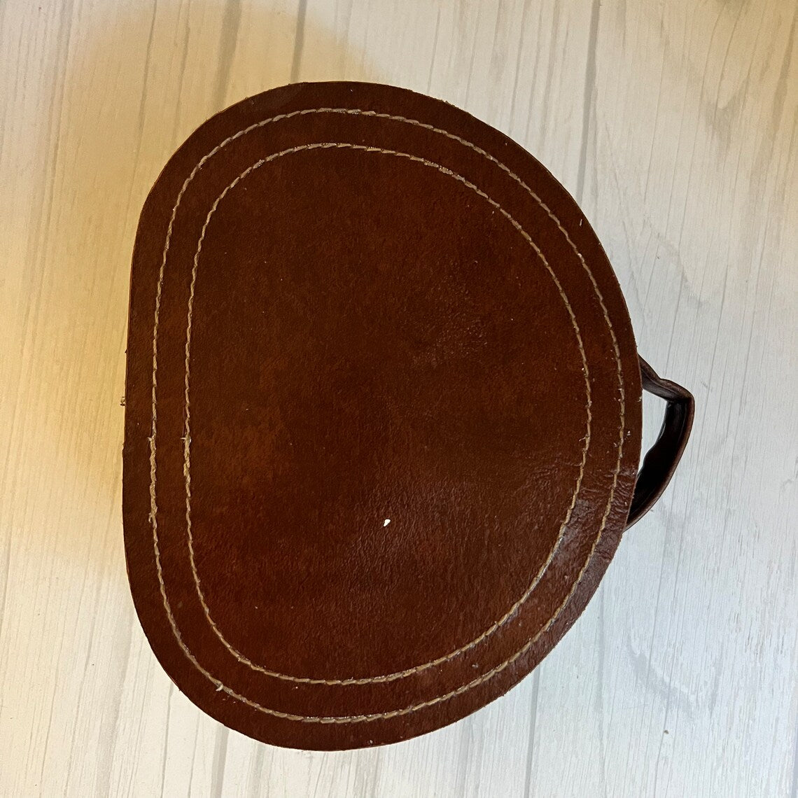 Rich Warm Brown Compact Oval Vintage Carry Case With Concentric Contrast Stitching, Antique Metal Latch Hardware And Single Curved Front Hand Grip