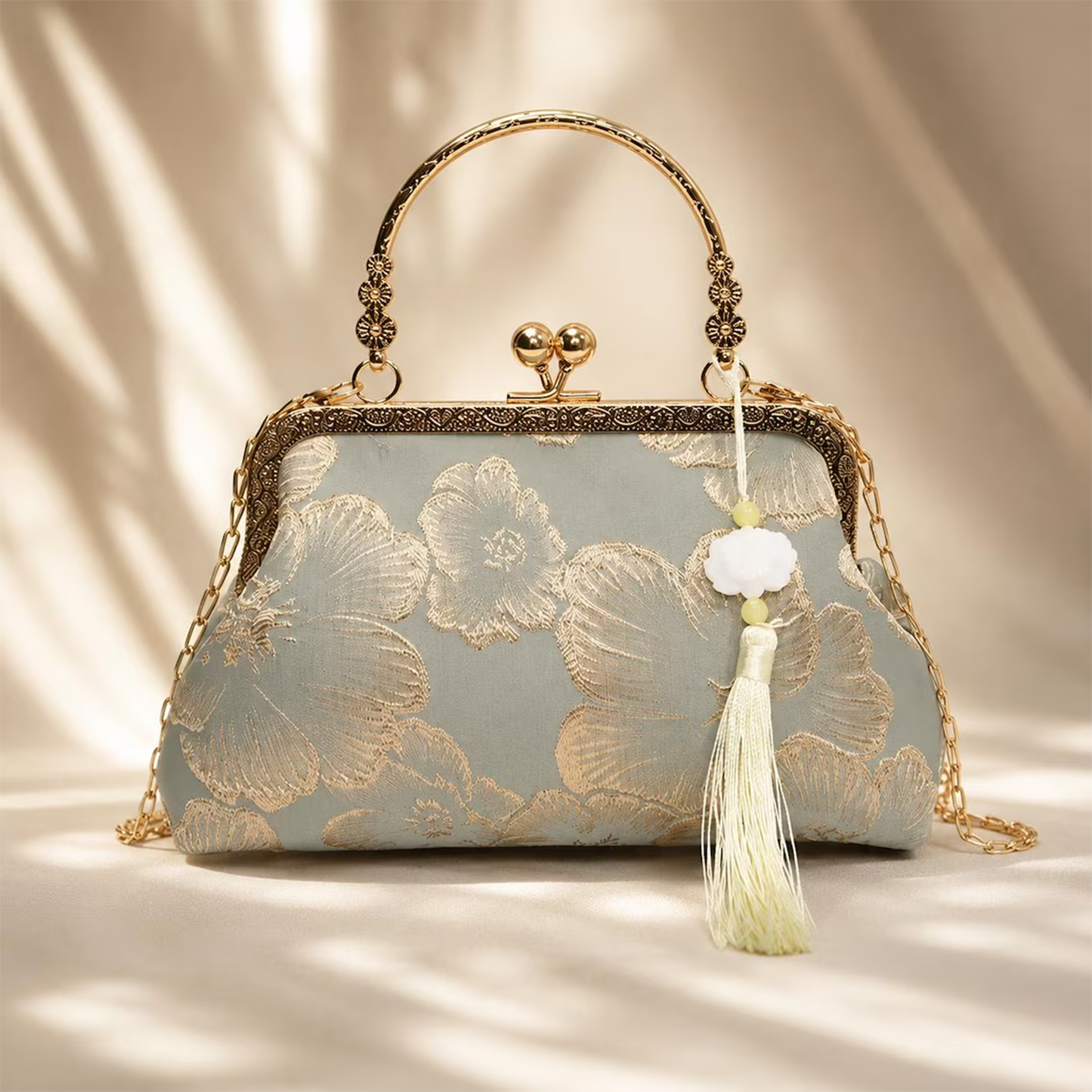 Soft Sage Grey Floral Embossed Kiss-Lock Frame Handbag With Carved Metal Top Handle, Cloud Stone Tassel Pendant And Detachable Metal Carry Chain