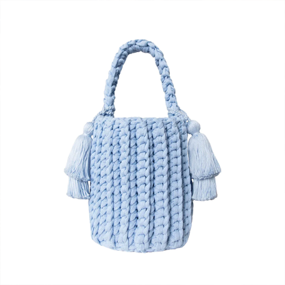 Multi-Tone Chunky Vertical Knit Compact Bucket Handbag With Braided Loop Handle And Dual Layer Fabric Tassel Side Embellishments Handbag
