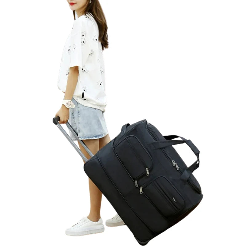 Jet Black Expandable Rectangular Rolling Travel Carryall With Multi External Zipper Pockets, Dual Top Grip Handles And Base Rolling Wheel Fixtures